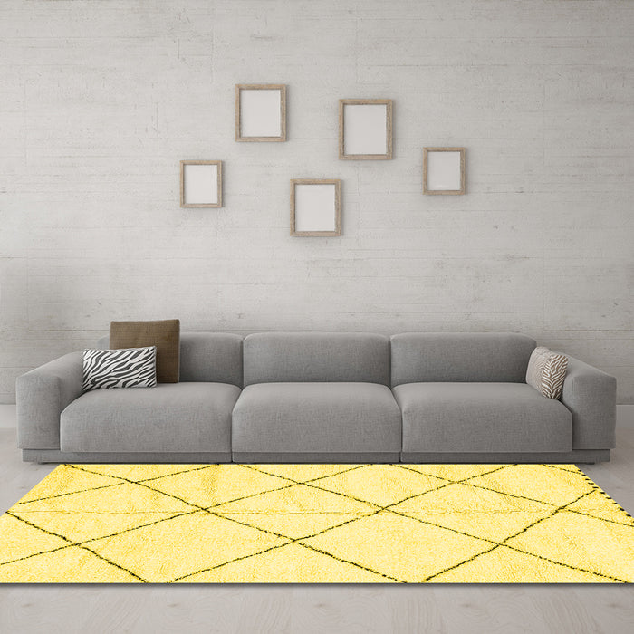 Machine Washable Solid Yellow Modern Rug in a Living Room, wshabs2917yw