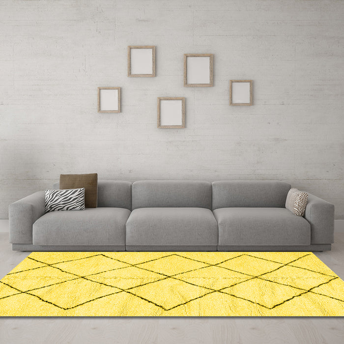 Machine Washable Solid Yellow Modern Rug in a Living Room, wshabs2921yw