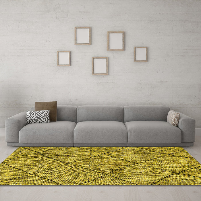 Machine Washable Solid Yellow Modern Rug in a Living Room, wshabs2922yw