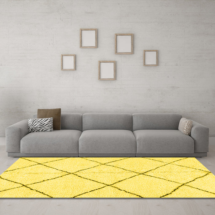 Machine Washable Solid Yellow Modern Rug in a Living Room, wshabs2923yw