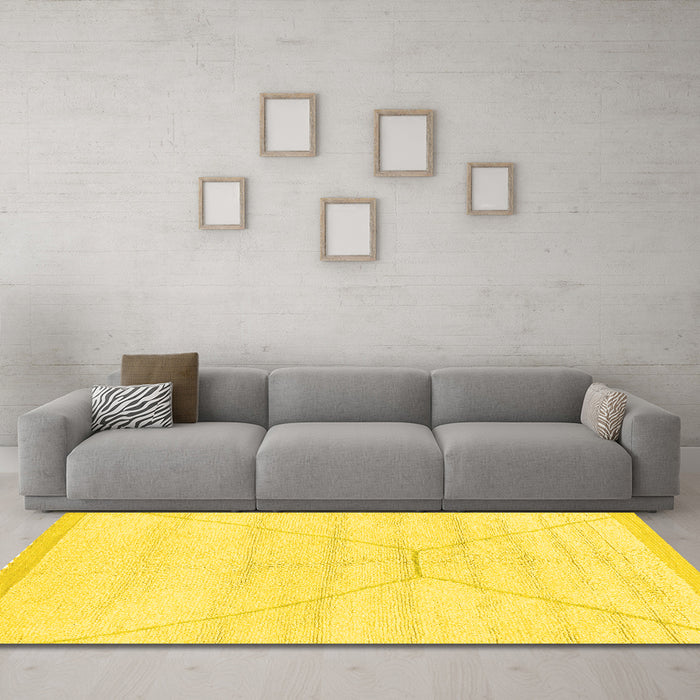 Machine Washable Solid Yellow Modern Rug in a Living Room, wshabs2924yw