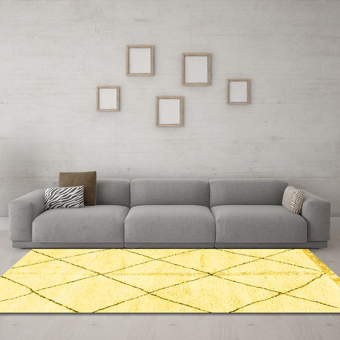 Machine Washable Solid Yellow Modern Rug in a Living Room, wshabs2925yw