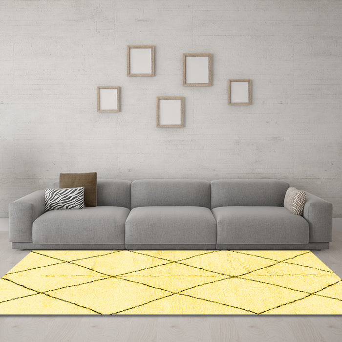 Machine Washable Solid Yellow Modern Rug in a Living Room, wshabs2926yw
