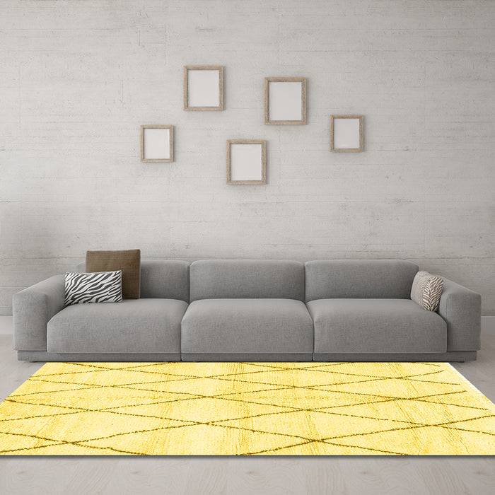 Machine Washable Solid Yellow Modern Rug in a Living Room, wshabs2927yw