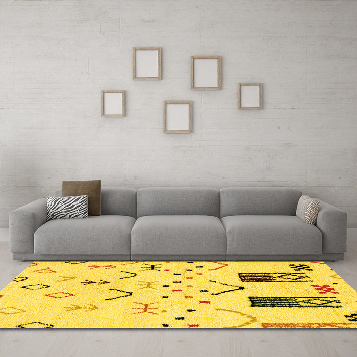Machine Washable Solid Yellow Modern Rug in a Living Room, wshabs2932yw