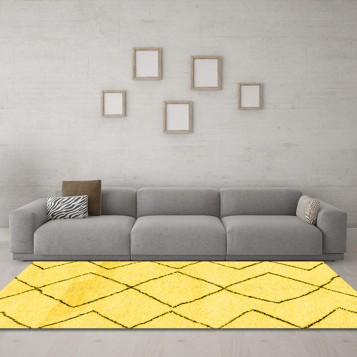 Machine Washable Solid Yellow Modern Rug in a Living Room, wshabs2933yw