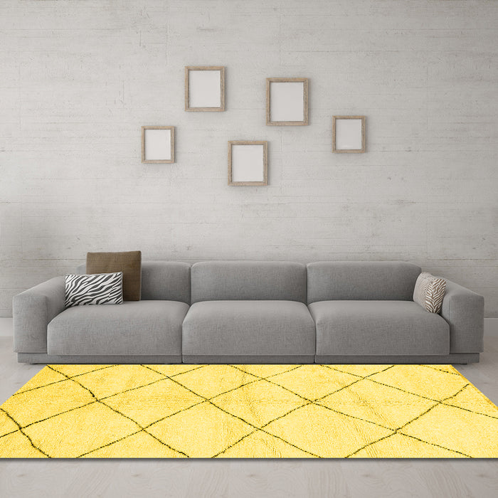Machine Washable Solid Yellow Modern Rug in a Living Room, wshabs2935yw