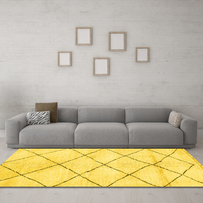 Machine Washable Solid Yellow Modern Rug in a Living Room, wshabs2936yw