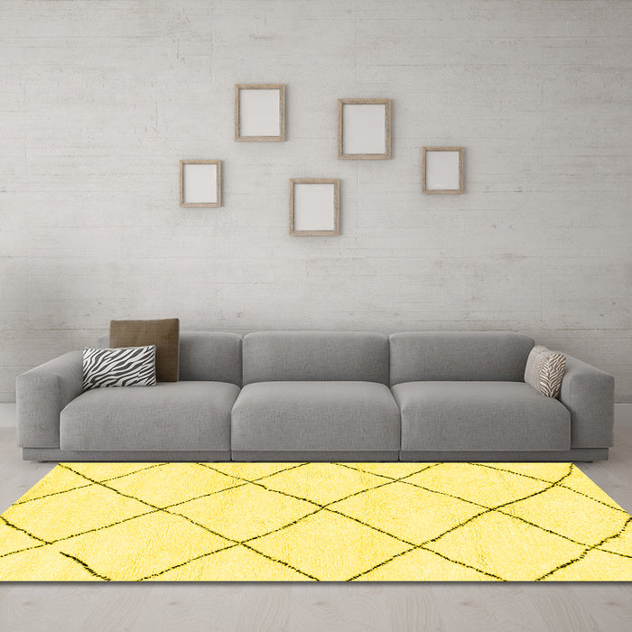 Machine Washable Solid Yellow Modern Rug in a Living Room, wshabs2938yw