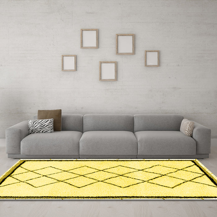 Machine Washable Solid Yellow Modern Rug in a Living Room, wshabs2940yw