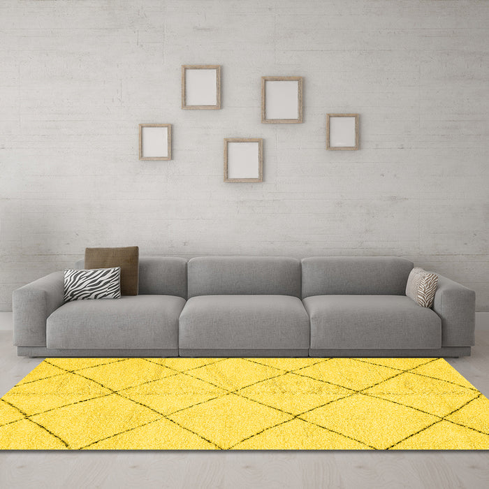 Machine Washable Solid Yellow Modern Rug in a Living Room, wshabs2945yw