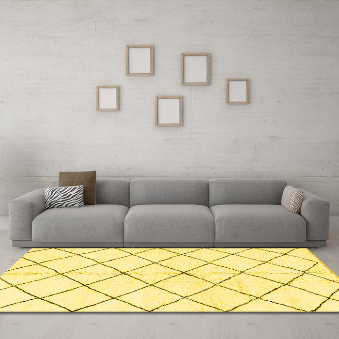 Machine Washable Solid Yellow Modern Rug in a Living Room, wshabs2948yw