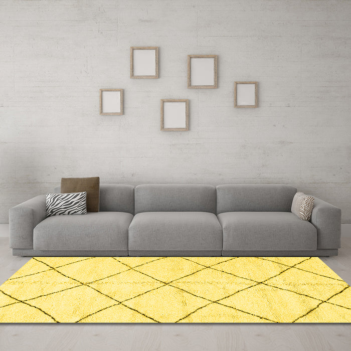 Machine Washable Solid Yellow Modern Rug in a Living Room, wshabs2950yw