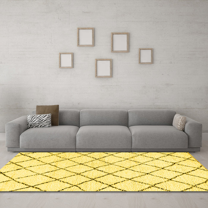 Machine Washable Solid Yellow Modern Rug in a Living Room, wshabs2953yw