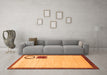 Machine Washable Solid Orange Modern Area Rugs in a Living Room, wshabs2org