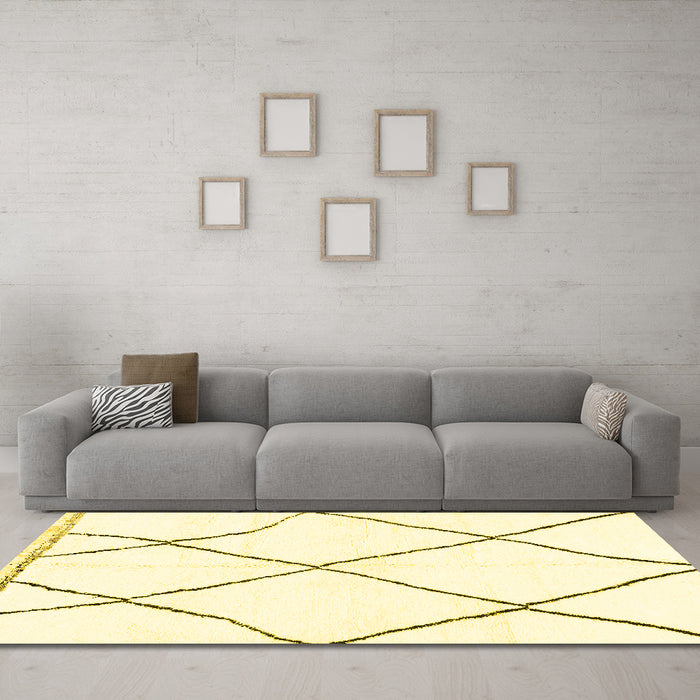 Machine Washable Solid Yellow Modern Rug in a Living Room, wshabs3061yw
