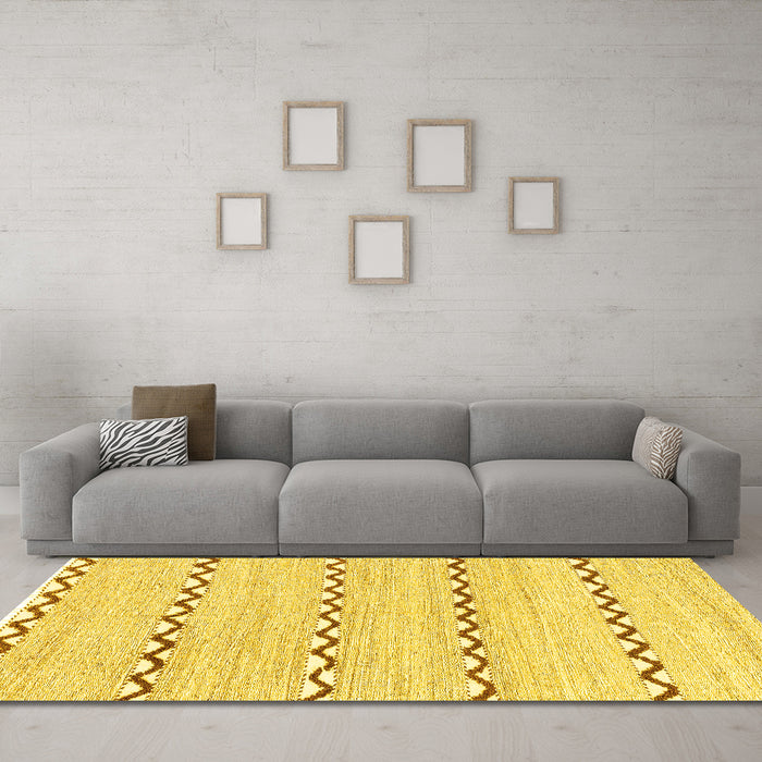 Machine Washable Solid Yellow Modern Rug in a Living Room, wshabs3062yw