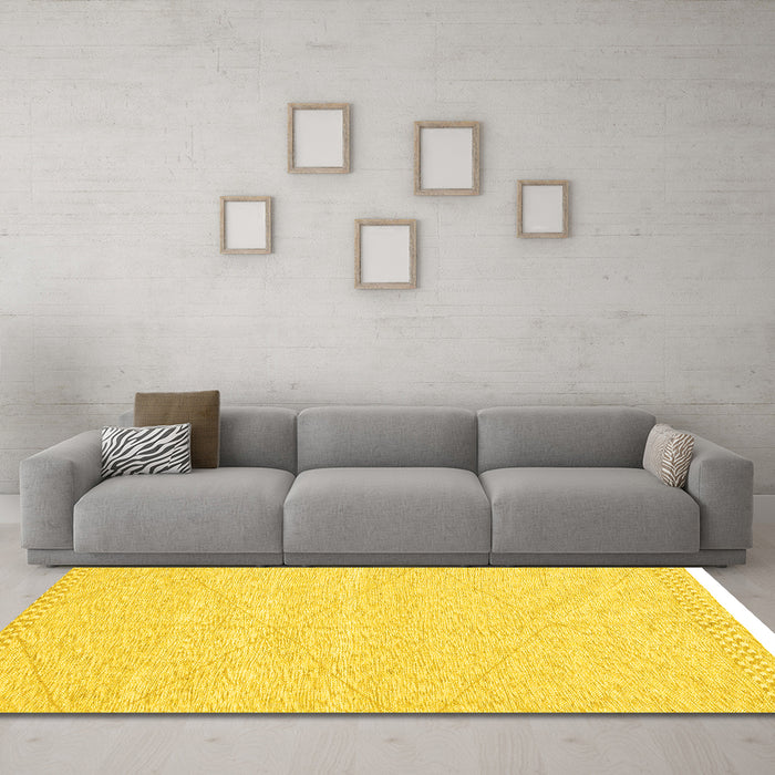 Machine Washable Solid Yellow Modern Rug in a Living Room, wshabs3074yw