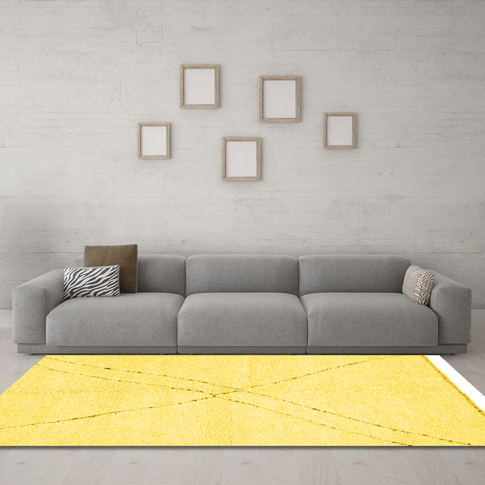Machine Washable Solid Yellow Modern Rug in a Living Room, wshabs3089yw