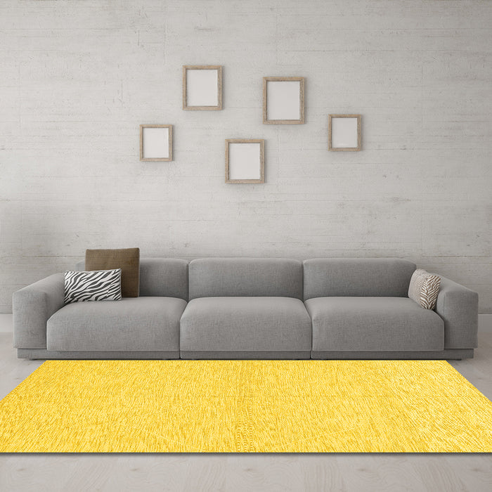 Machine Washable Solid Yellow Modern Rug in a Living Room, wshabs3139yw