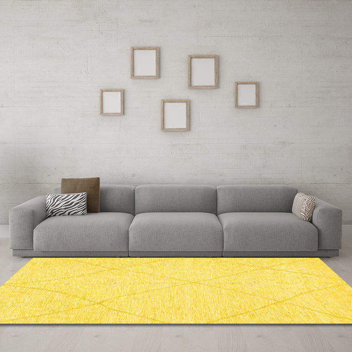 Machine Washable Solid Yellow Modern Rug in a Living Room, wshabs3141yw