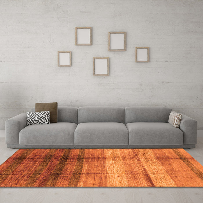 Machine Washable Abstract Orange Modern Area Rugs in a Living Room, wshabs3282org