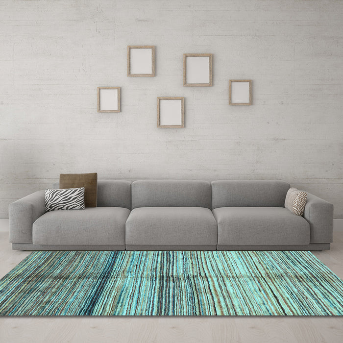 Machine Washable Oriental Light Blue Modern Rug in a Living Room, wshabs3384lblu