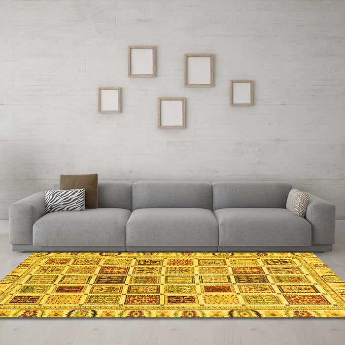 Machine Washable Oriental Yellow Modern Rug in a Living Room, wshabs3397yw