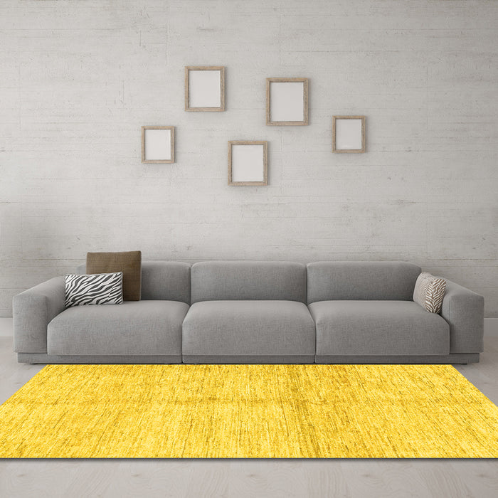 Machine Washable Solid Yellow Modern Rug in a Living Room, wshabs3412yw
