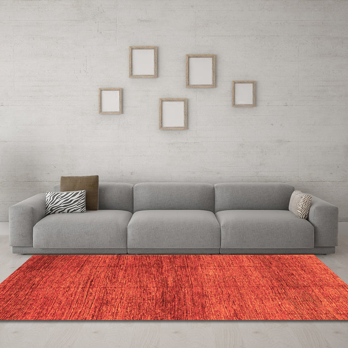 Machine Washable Abstract Orange Modern Area Rugs in a Living Room, wshabs3424org