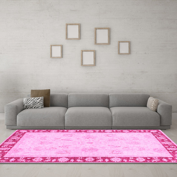 Machine Washable Oriental Pink Traditional Rug in a Living Room, wshabs3427pnk