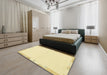 Abstract Sun Yellow Solid Rug in a Bedroom, abs3442