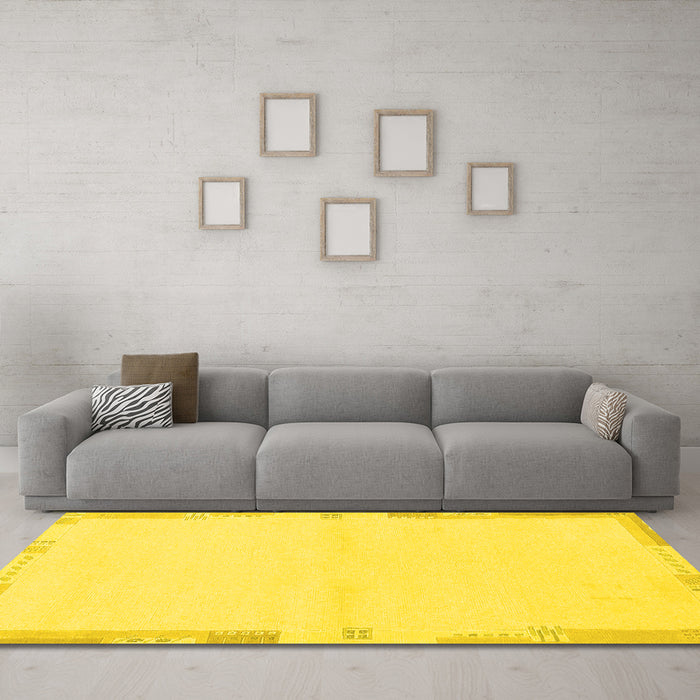 Machine Washable Solid Yellow Modern Rug in a Living Room, wshabs3442yw
