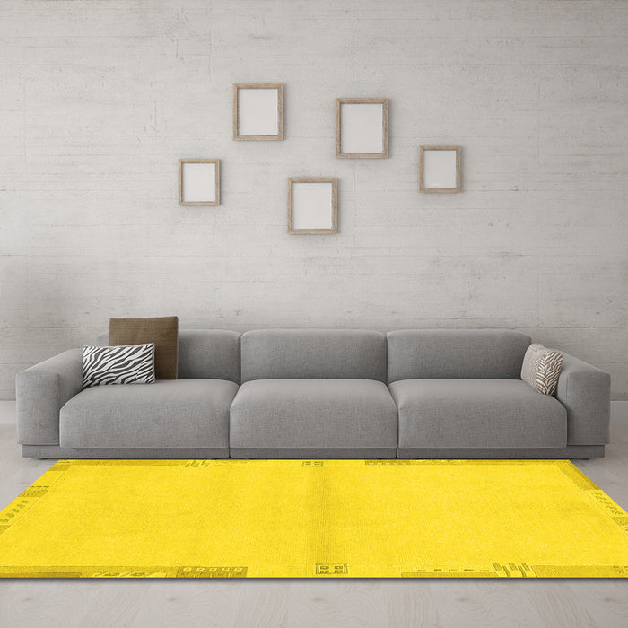 Machine Washable Solid Yellow Modern Rug in a Living Room, wshabs3445yw