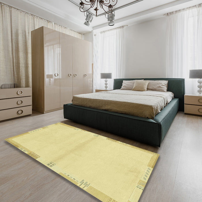 Machine Washable Abstract Chrome Gold Yellow Rug in a Bedroom, wshabs3445