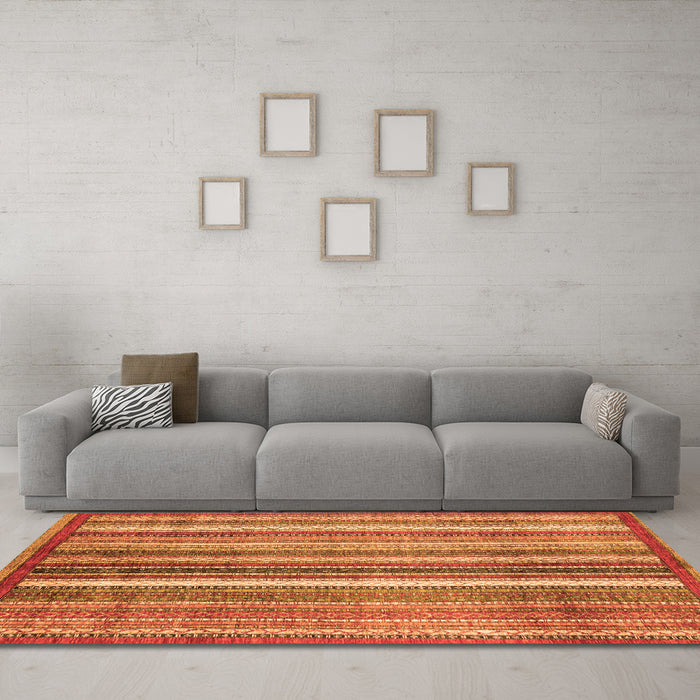 Machine Washable Abstract Orange Modern Area Rugs in a Living Room, wshabs3451org