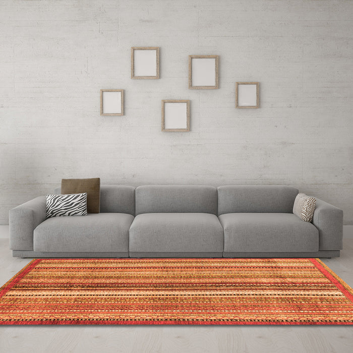 Machine Washable Abstract Orange Modern Area Rugs in a Living Room, wshabs3452org
