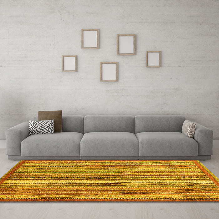 Machine Washable Abstract Yellow Modern Rug in a Living Room, wshabs3452yw