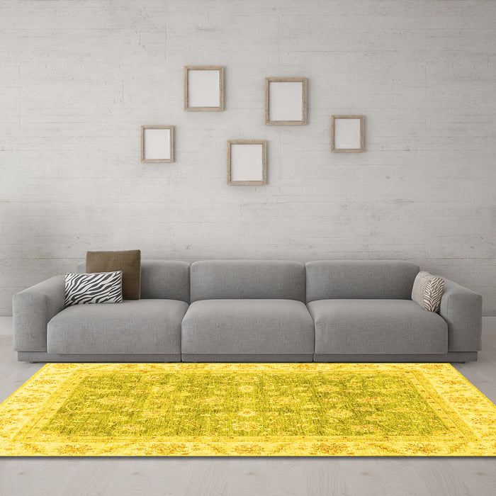 Machine Washable Oriental Yellow Traditional Rug in a Living Room, wshabs3460yw