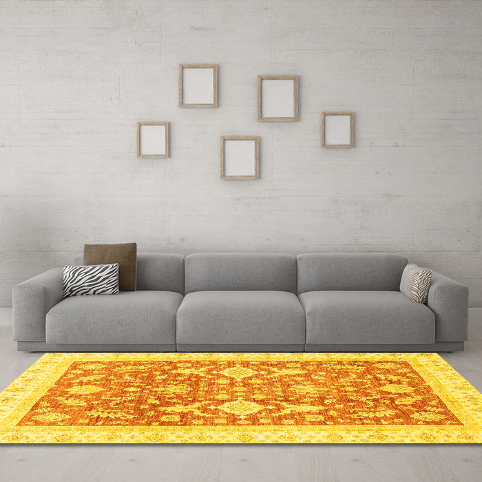 Machine Washable Oriental Yellow Traditional Rug in a Living Room, wshabs3462yw