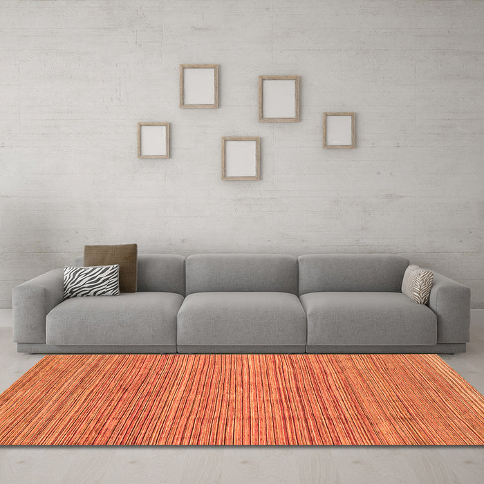 Machine Washable Abstract Orange Modern Area Rugs in a Living Room, wshabs3490org