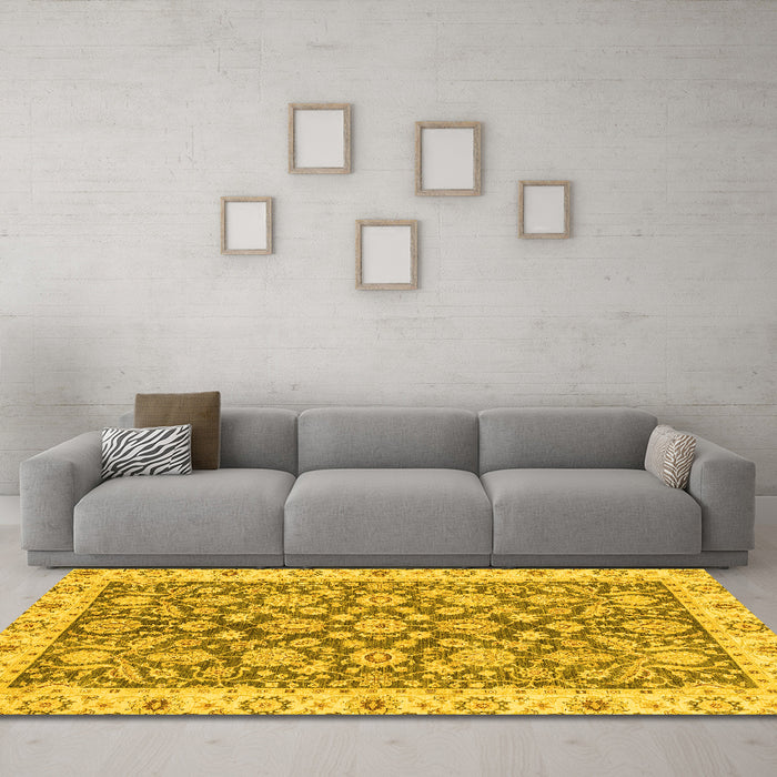 Machine Washable Oriental Yellow Traditional Rug in a Living Room, wshabs3506yw