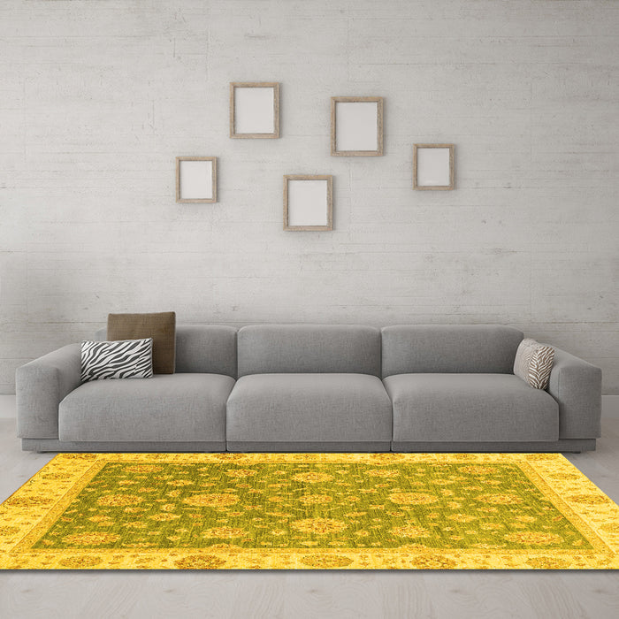 Machine Washable Oriental Yellow Traditional Rug in a Living Room, wshabs3516yw