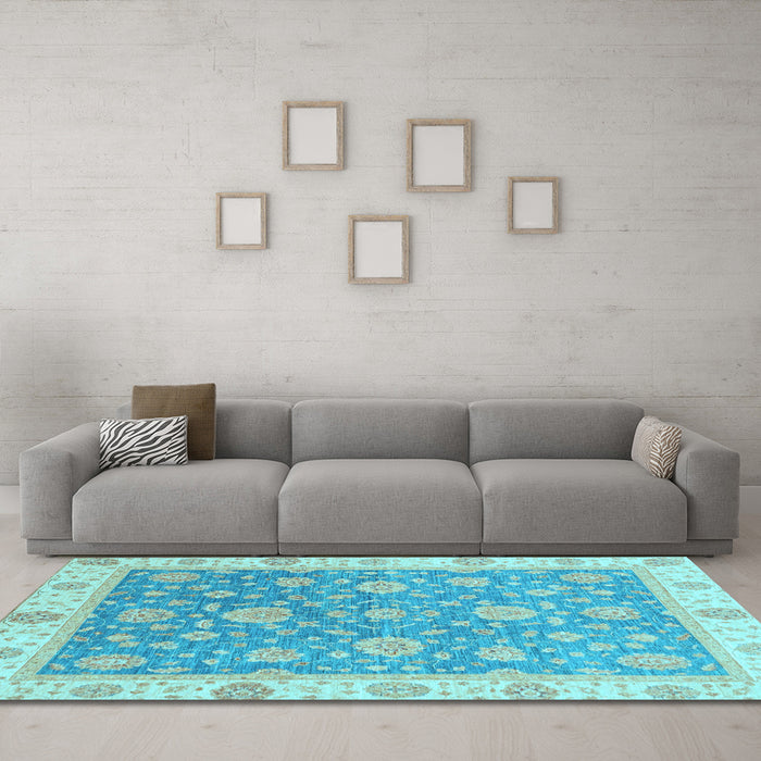 Machine Washable Oriental Light Blue Traditional Rug in a Living Room, wshabs3516lblu