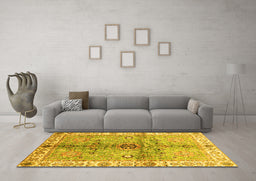 Machine Washable Oriental Yellow Traditional Rug in a Living Room, wshabs3522yw