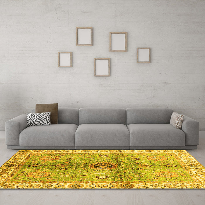 Machine Washable Oriental Yellow Traditional Rug in a Living Room, wshabs3522yw