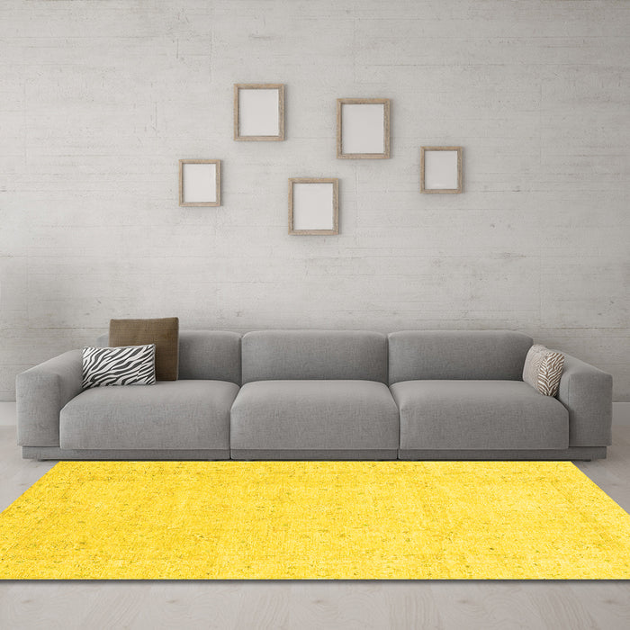 Machine Washable Oriental Yellow Traditional Rug in a Living Room, wshabs3554yw