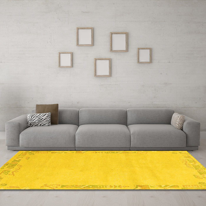 Machine Washable Solid Yellow Modern Rug in a Living Room, wshabs3579yw
