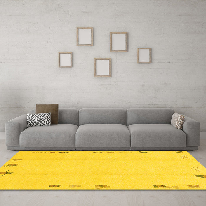 Machine Washable Solid Yellow Modern Rug in a Living Room, wshabs3584yw