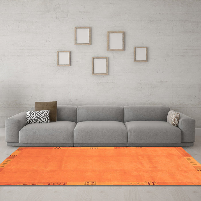 Machine Washable Abstract Orange Modern Area Rugs in a Living Room, wshabs3595org